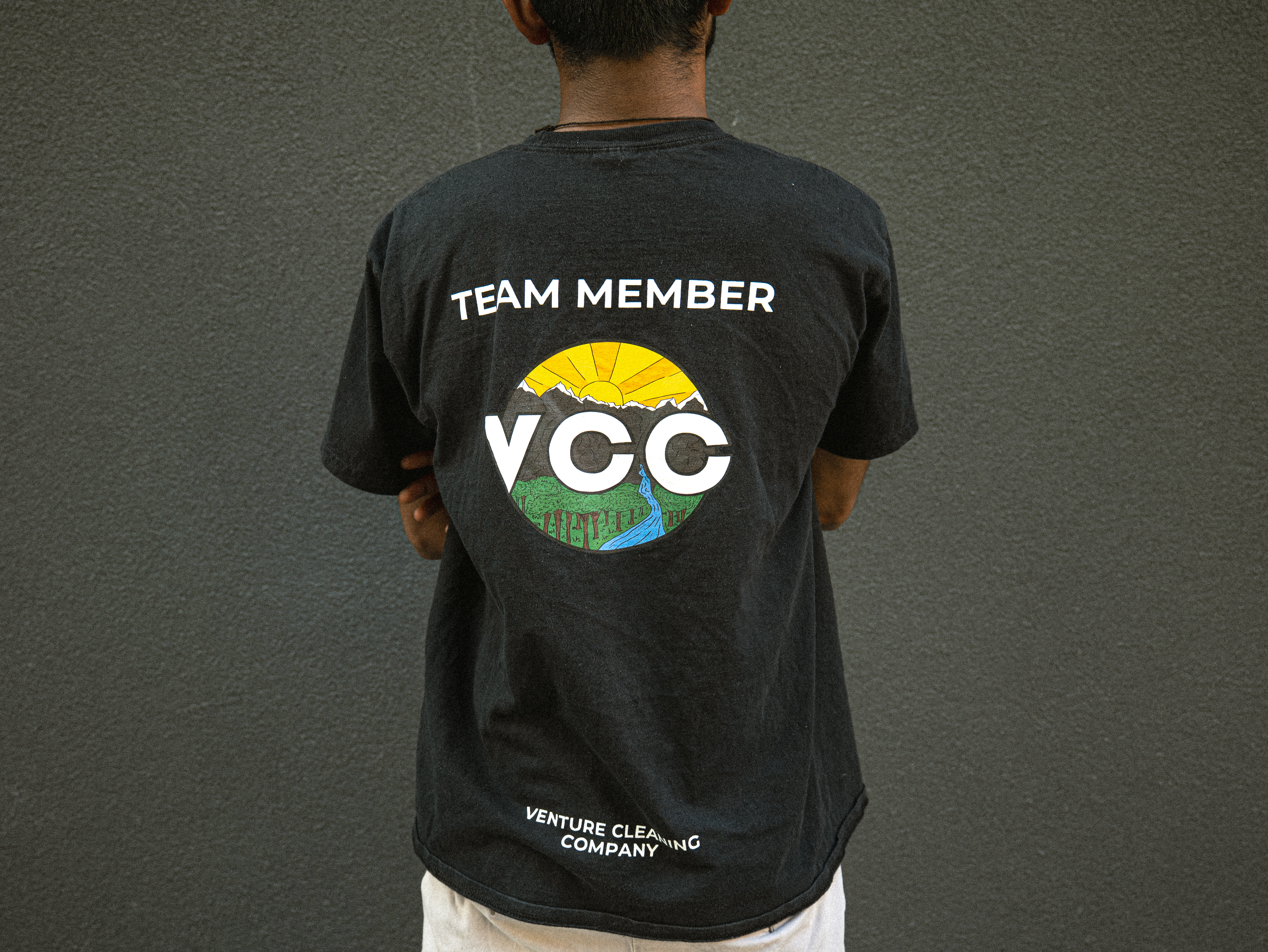 Venture Cleaning Company team member in branded uniform